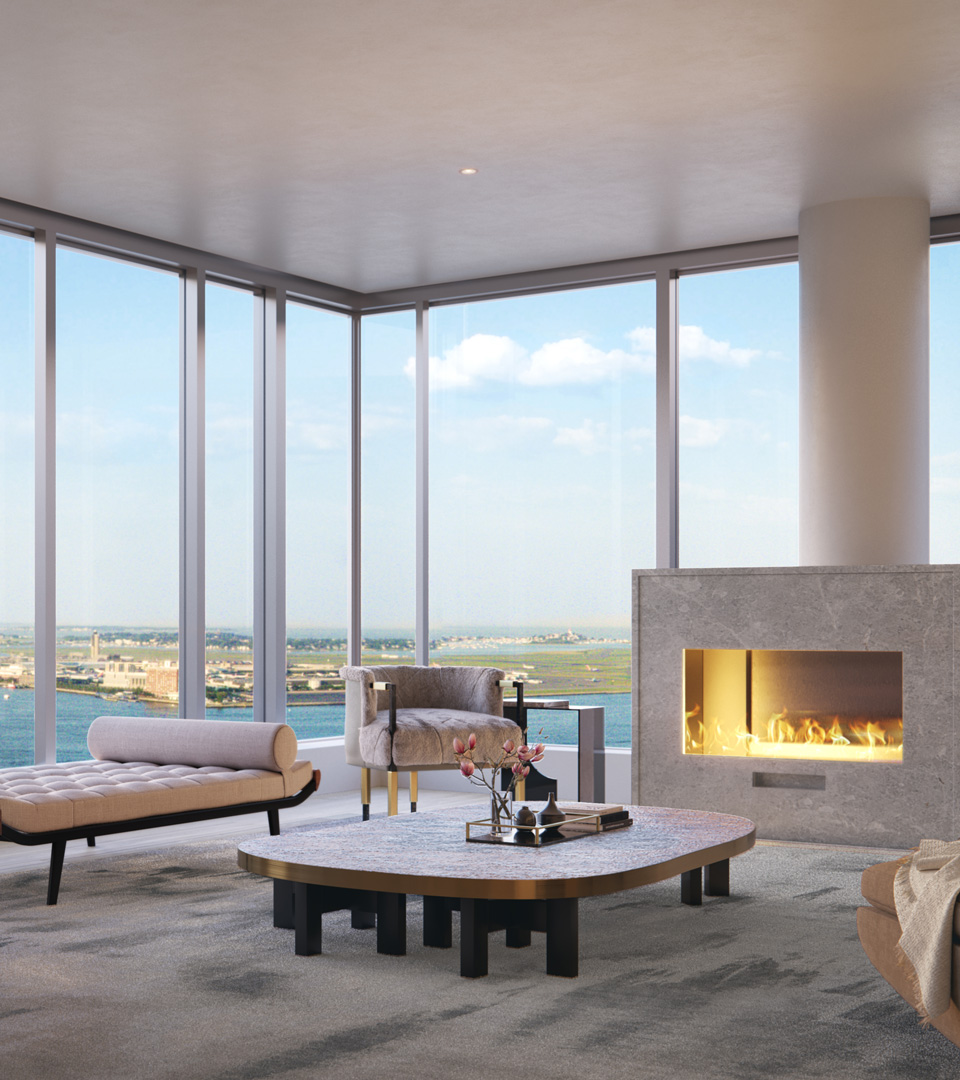 echelon seaport living room with fireplace looking out at boston harbor