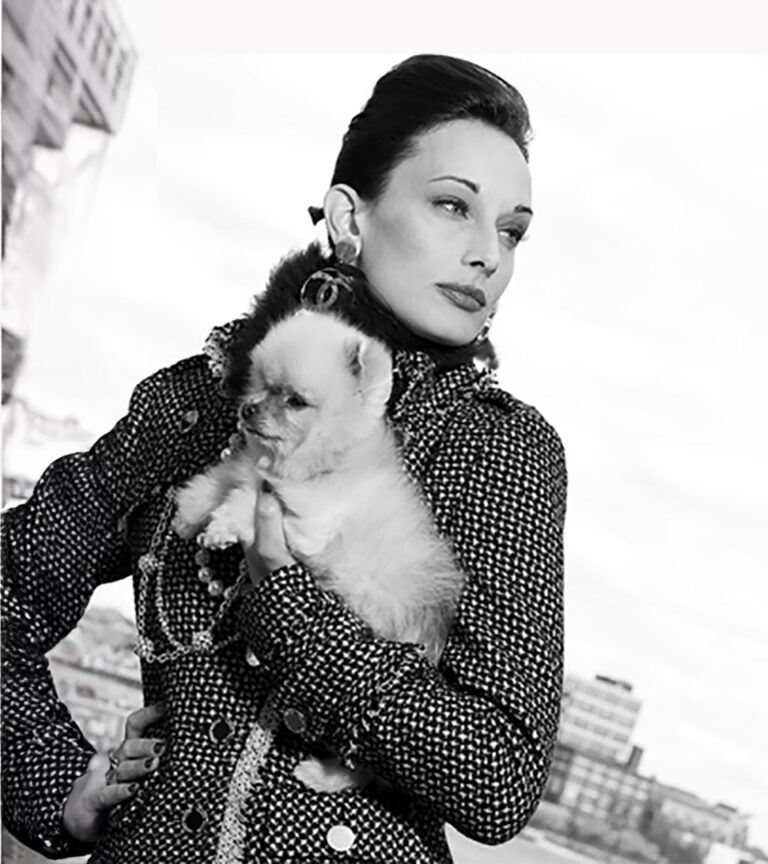 battery wharf woman holding dog in black and white