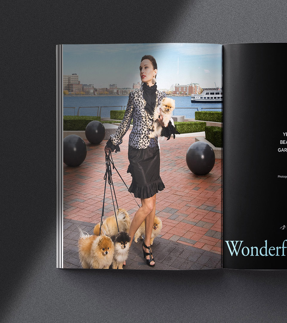 battery wharf woman with dogs double page spread on black vertical