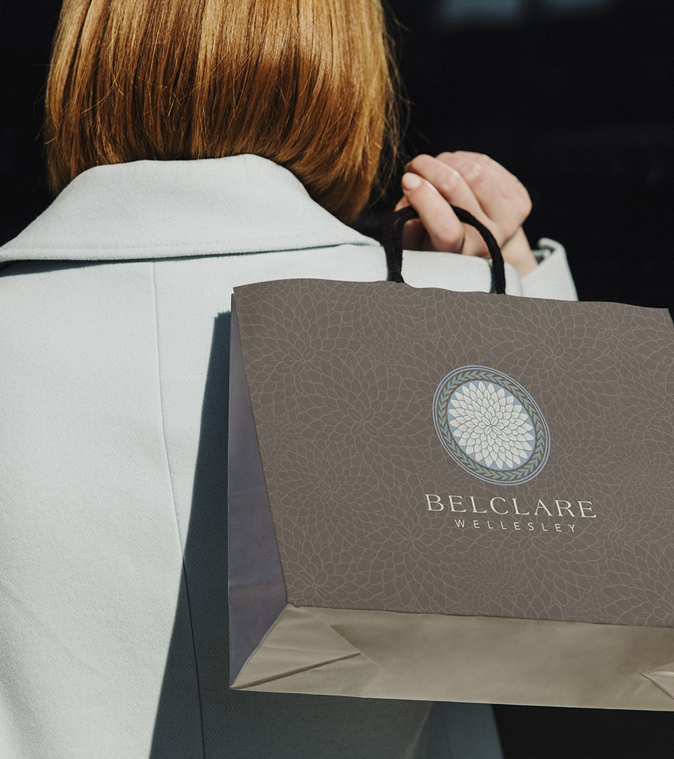 belclare wellesley woman and shopping bag