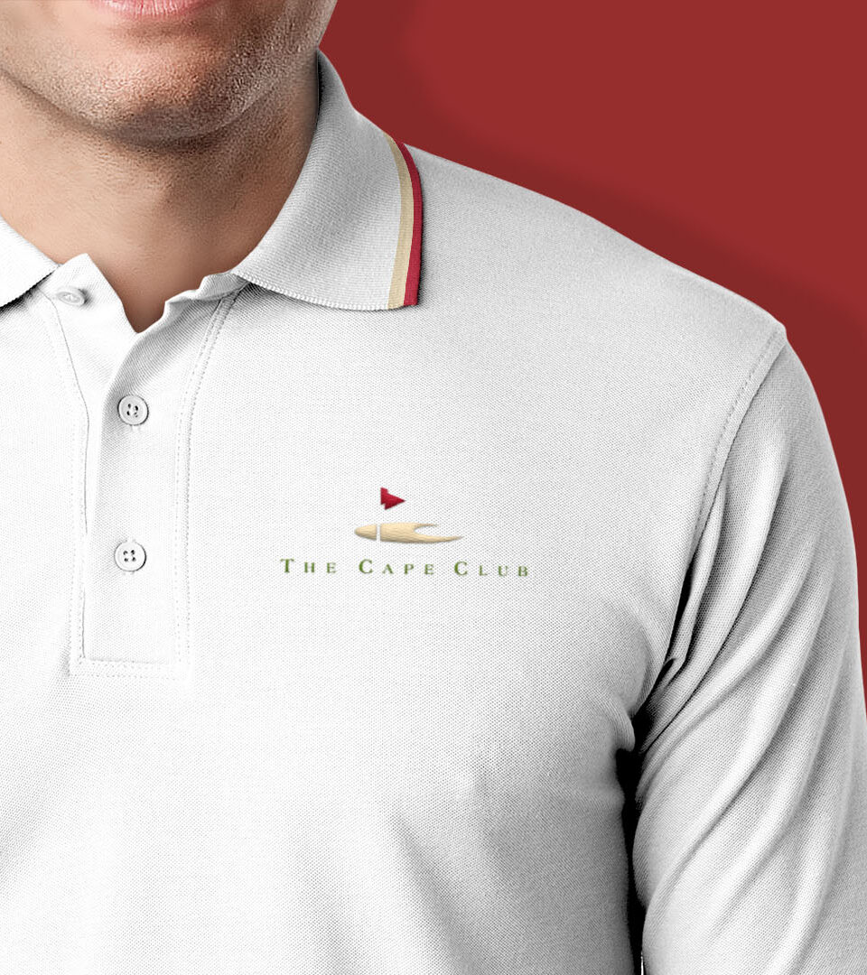 cape club logo on a white polo shirt with logo