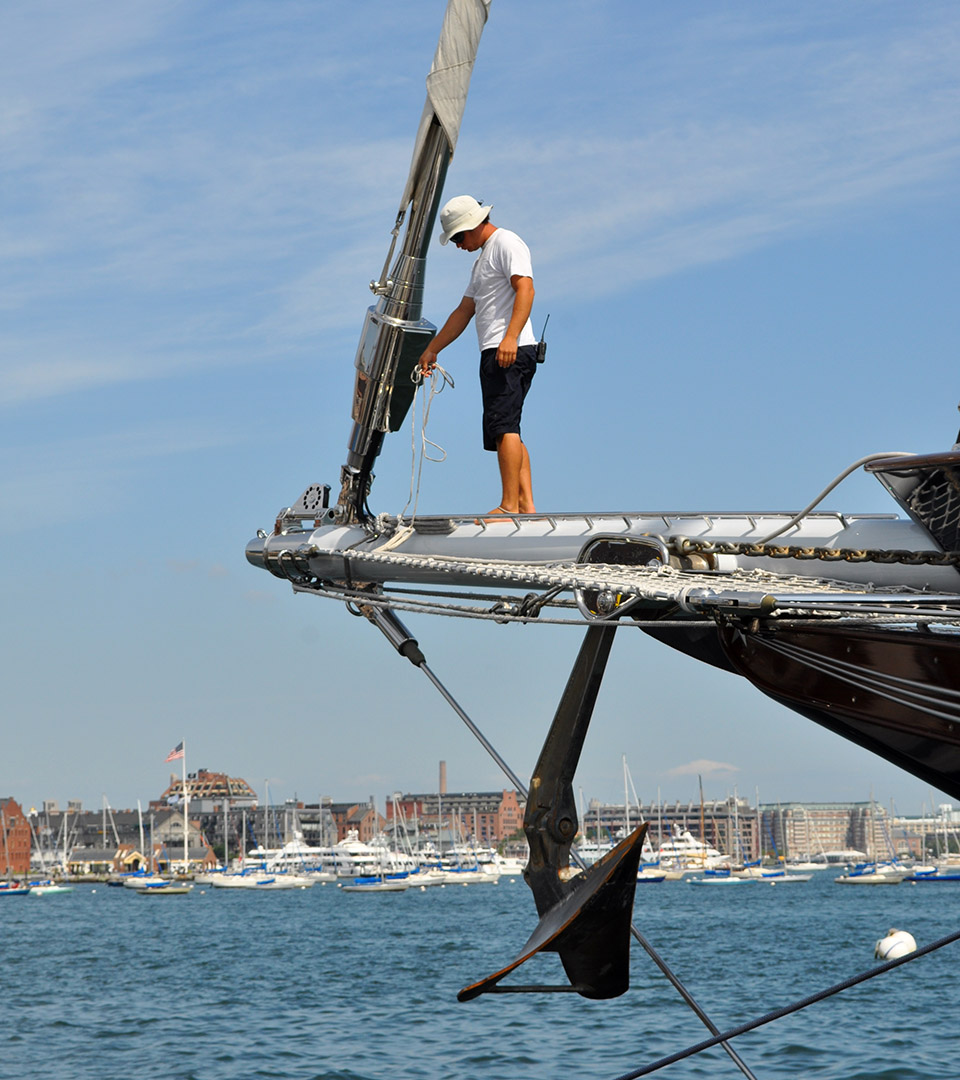 50 liberty man standing on yacht