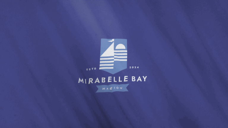 mirabelle bay logo on purple flag waving by boston graphic design studio