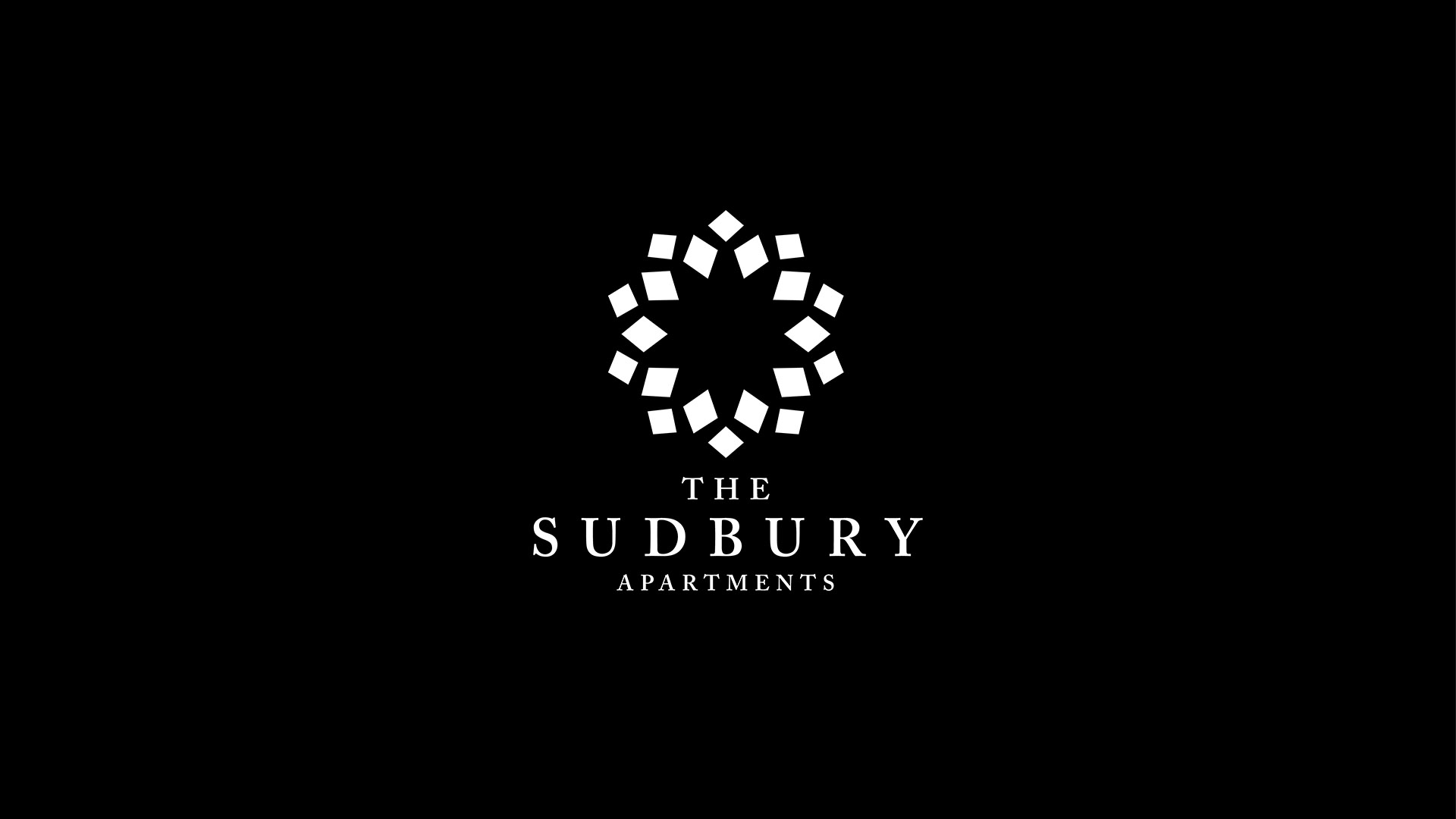 sudbury apartment white logo on black