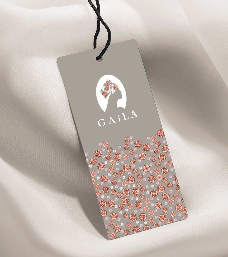 the gaila fund hang tag on white silk vertical