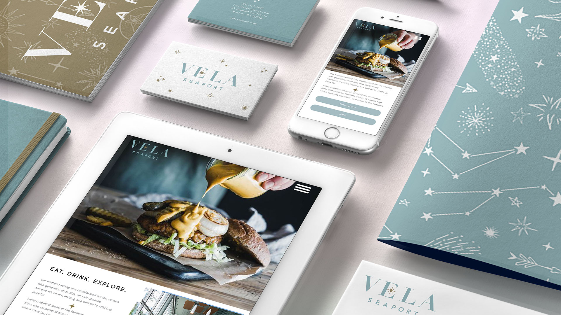 vela seaport branding with ipad and business cards